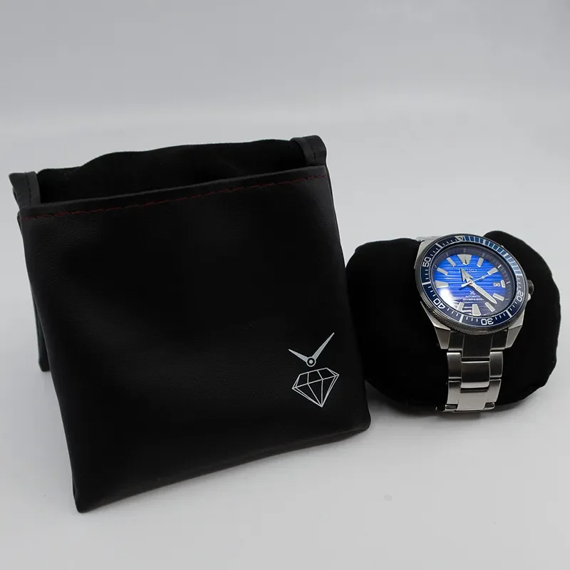 SKINN POSE M/PUTE SORT TIL UR